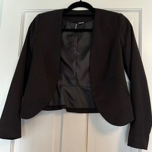 Cropped black blazer, really pretty ruffle on the bottom